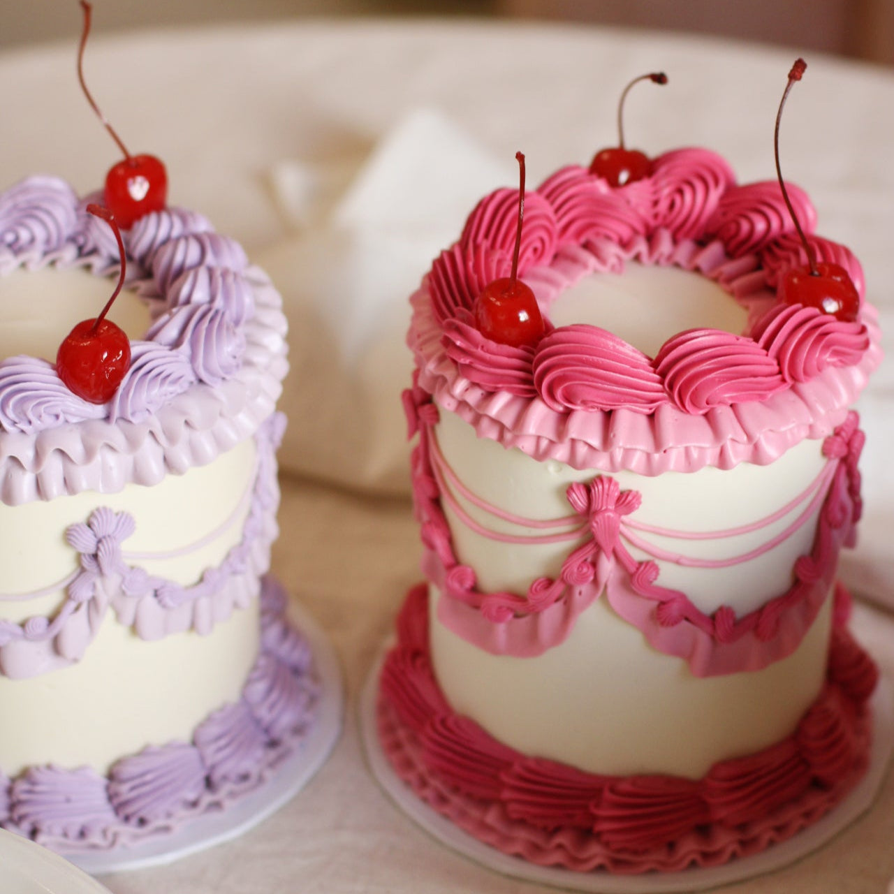 Antoinette mini Cakes - with pink & purple frills and red cherries