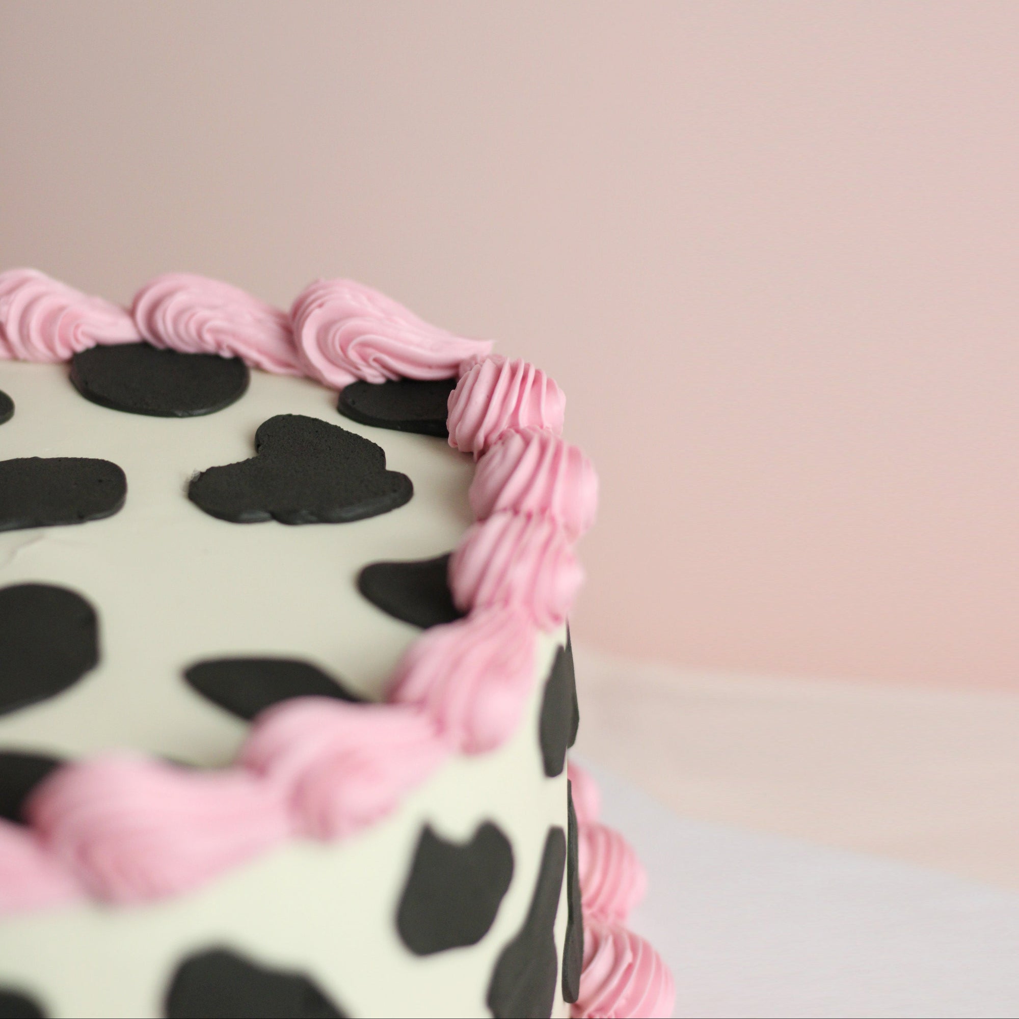 Cow Print Cake with vintage pink frills