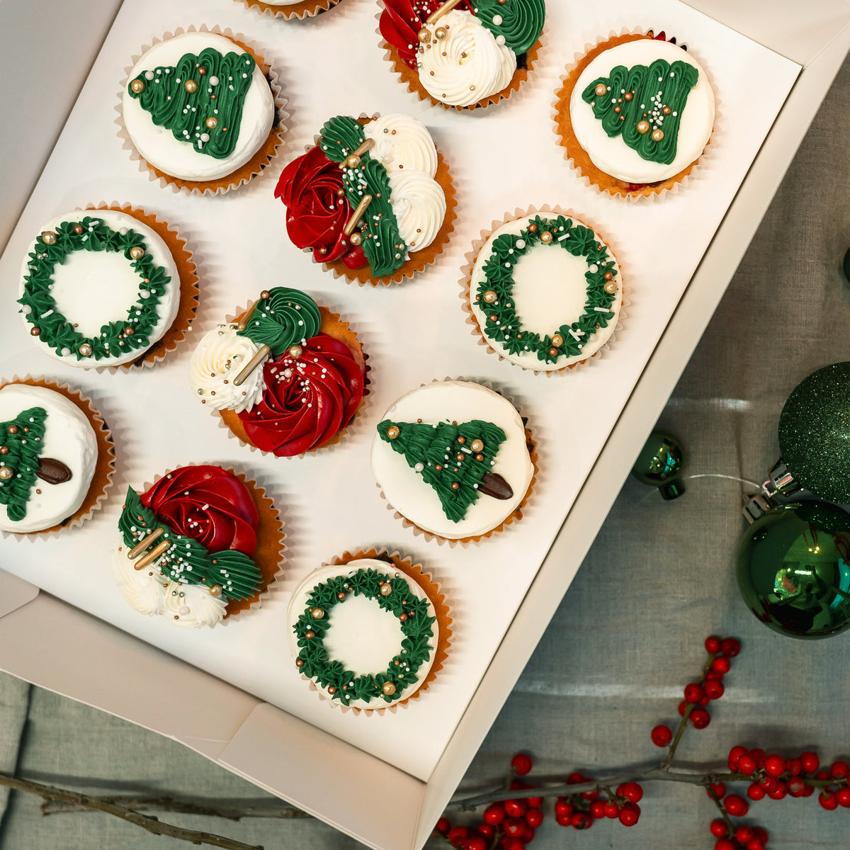 Christmas cupcakes in red, green, and white, perfect for holiday parties, festive dessert tables, and seasonal celebrations.