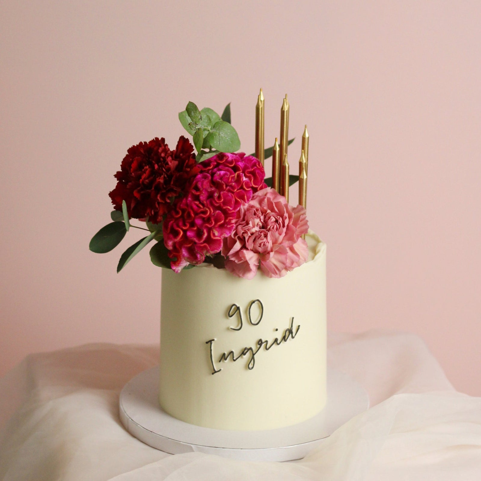 Floral cutie cake - bold florals and gold candles.
Made at our bakery in Kreuzberg - Delivered in Berlin
