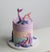 Mermaid underwater cake - decoated with sugar nermaid tails, buttercream reef & and pearls