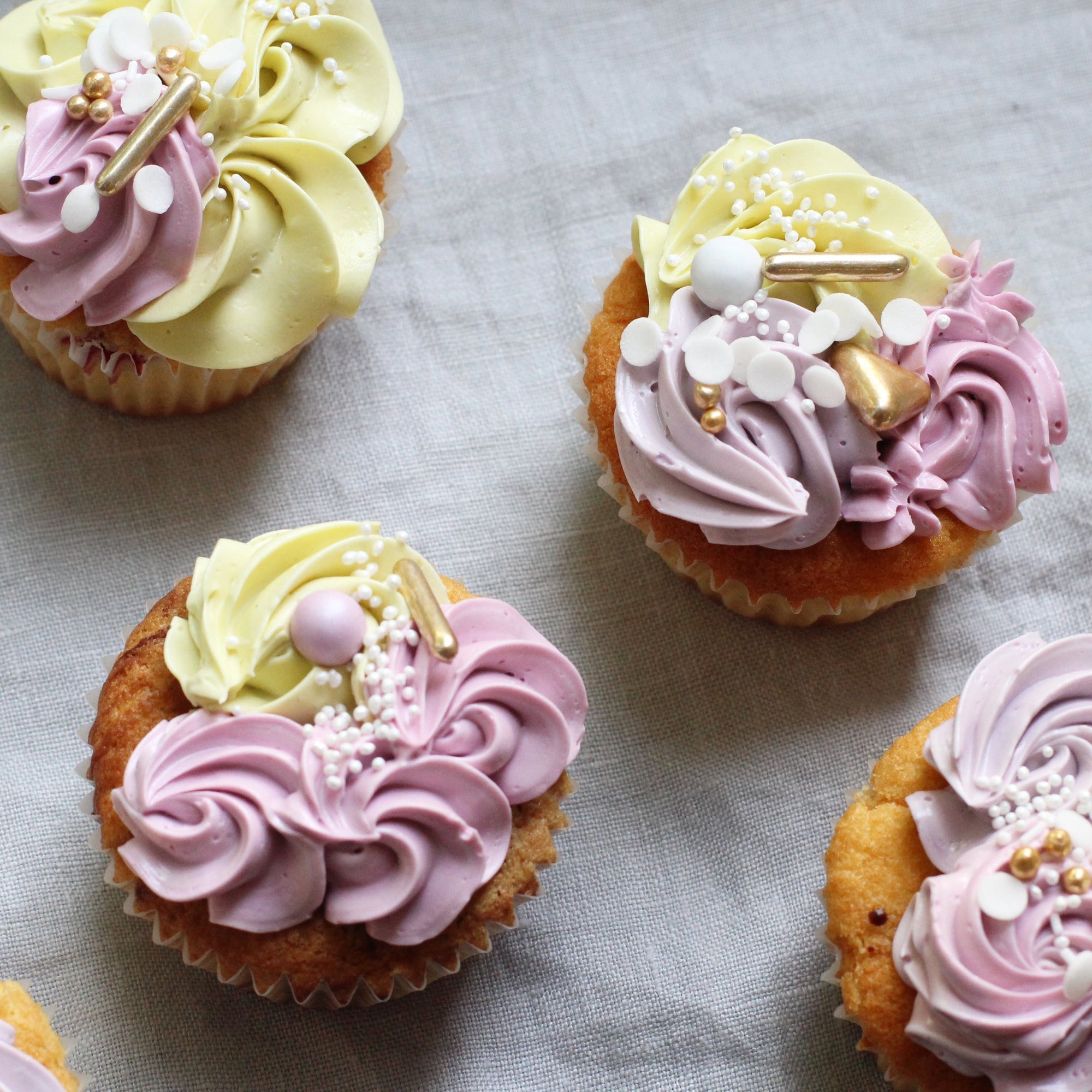 Cupcakes - our smallest sweet treats with pastel mixed buttercream piping!