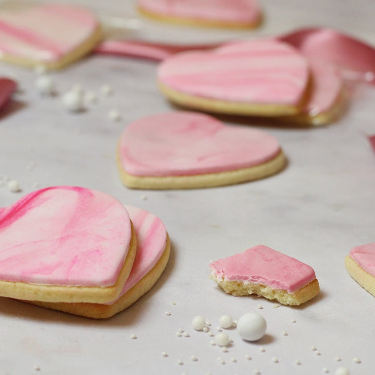 Heart cookies with pink marble fondant