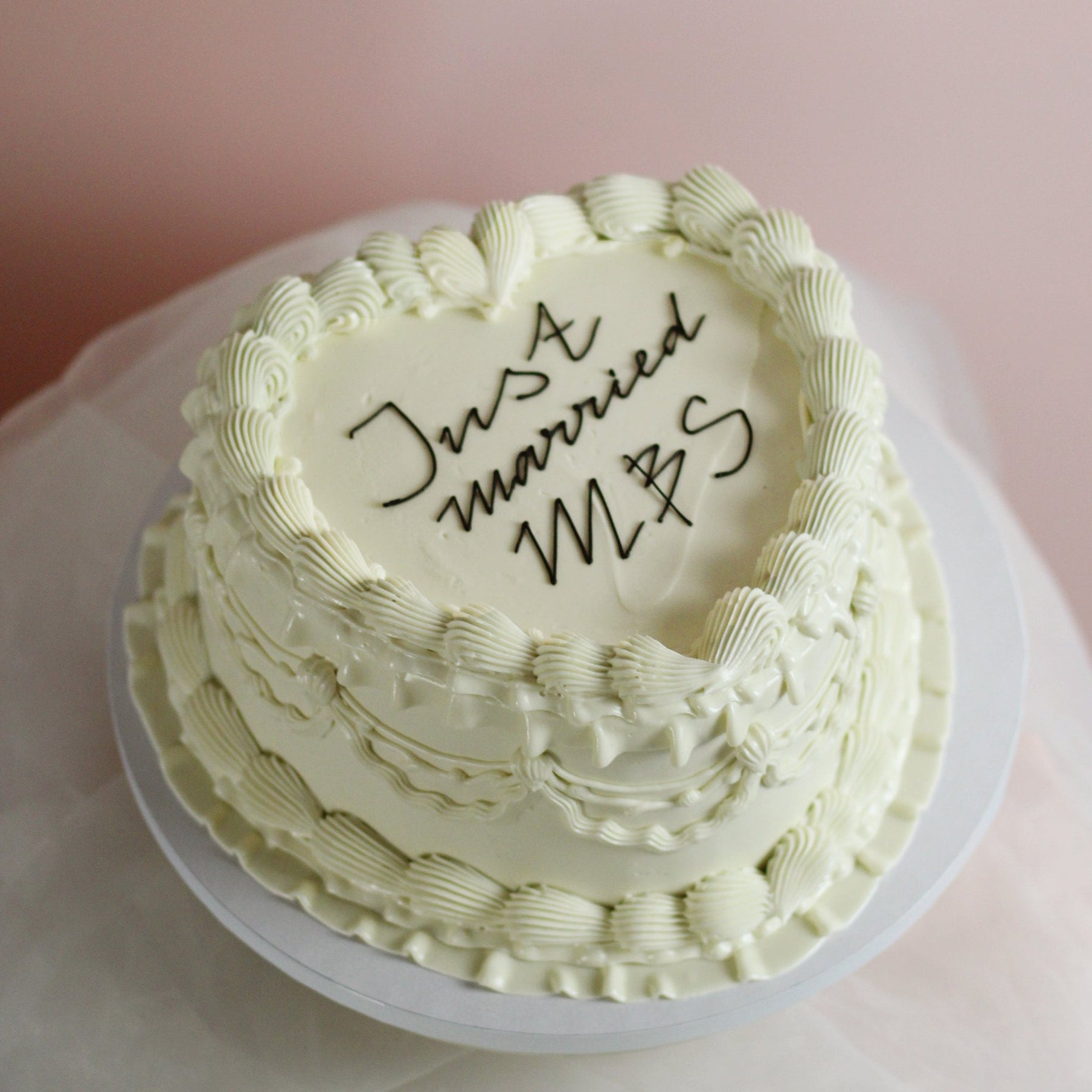  JUST MARRIED! Heart shapped vintage cake - decoarated with hand-pipped white buttercream frills. Customize yours silk bows and red cherries if you like!