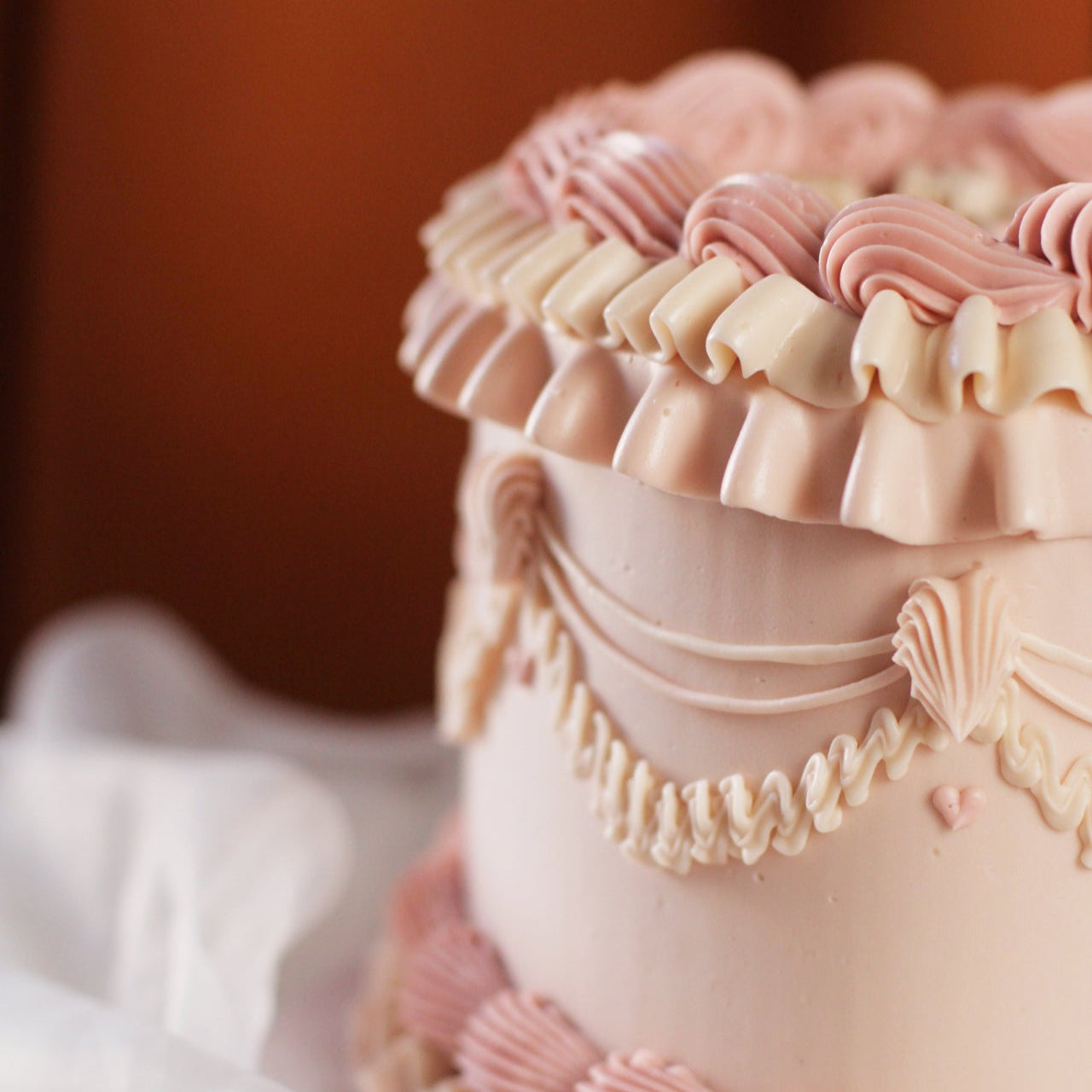 Vintage style cake - with rosé buttercream frills 