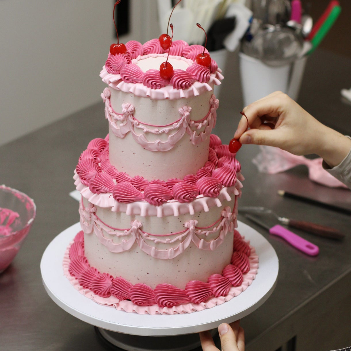 Pink vintage cake, red cherries, and all the details you LOOOOVE!