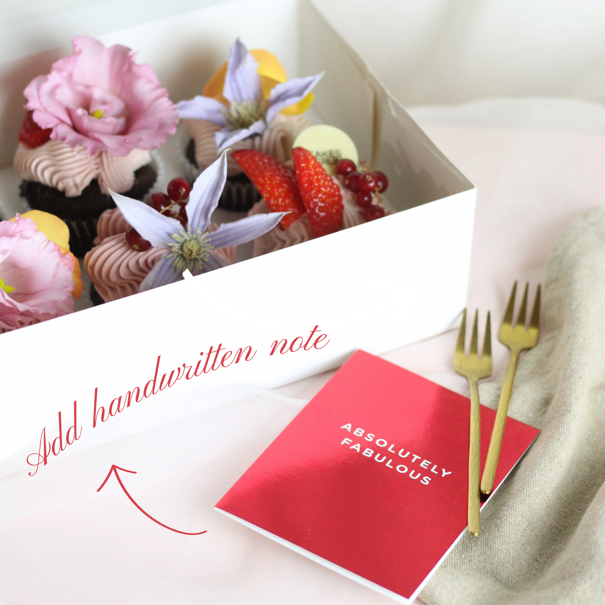 Valentine’s Special Box featuring cupcakes and buttery madeleines, along with an elegant handwritten card.
Perfect for celebrating love.