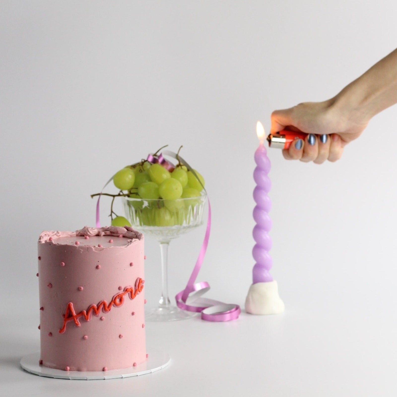 Celebrate love with our pink AMORE cake!