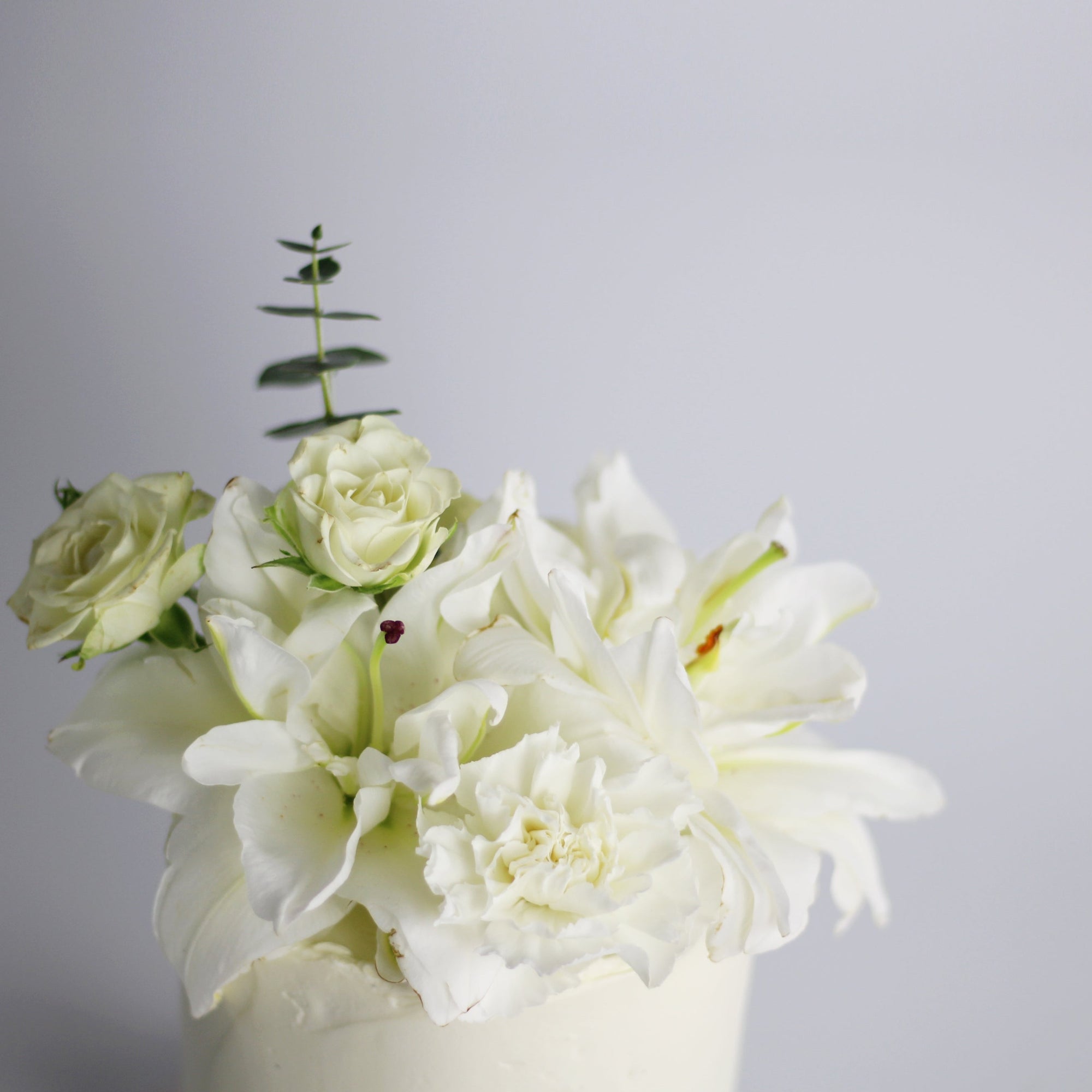 Floral Cutie Cake - Our signature blumen cake adorned with fresh flowers!