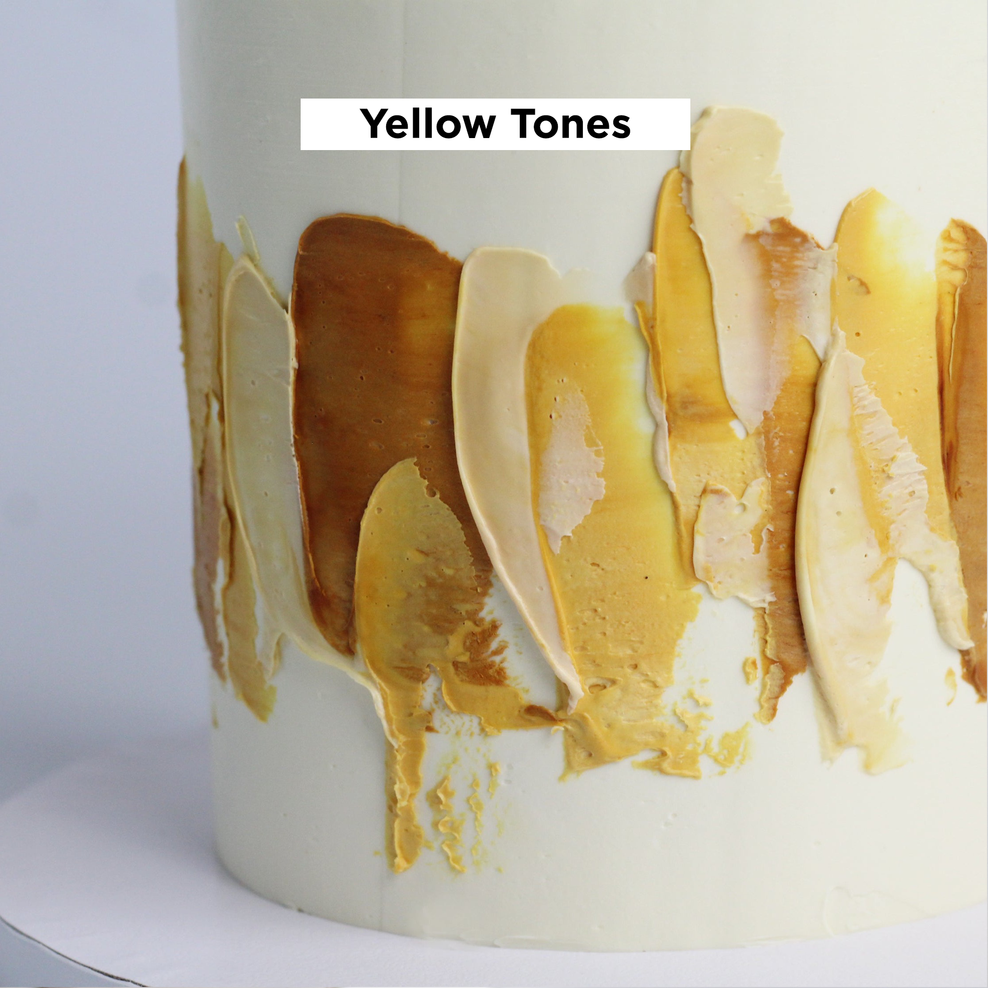 Our signature LUIZA cake adorned with abstract strokes in yellow tones.
